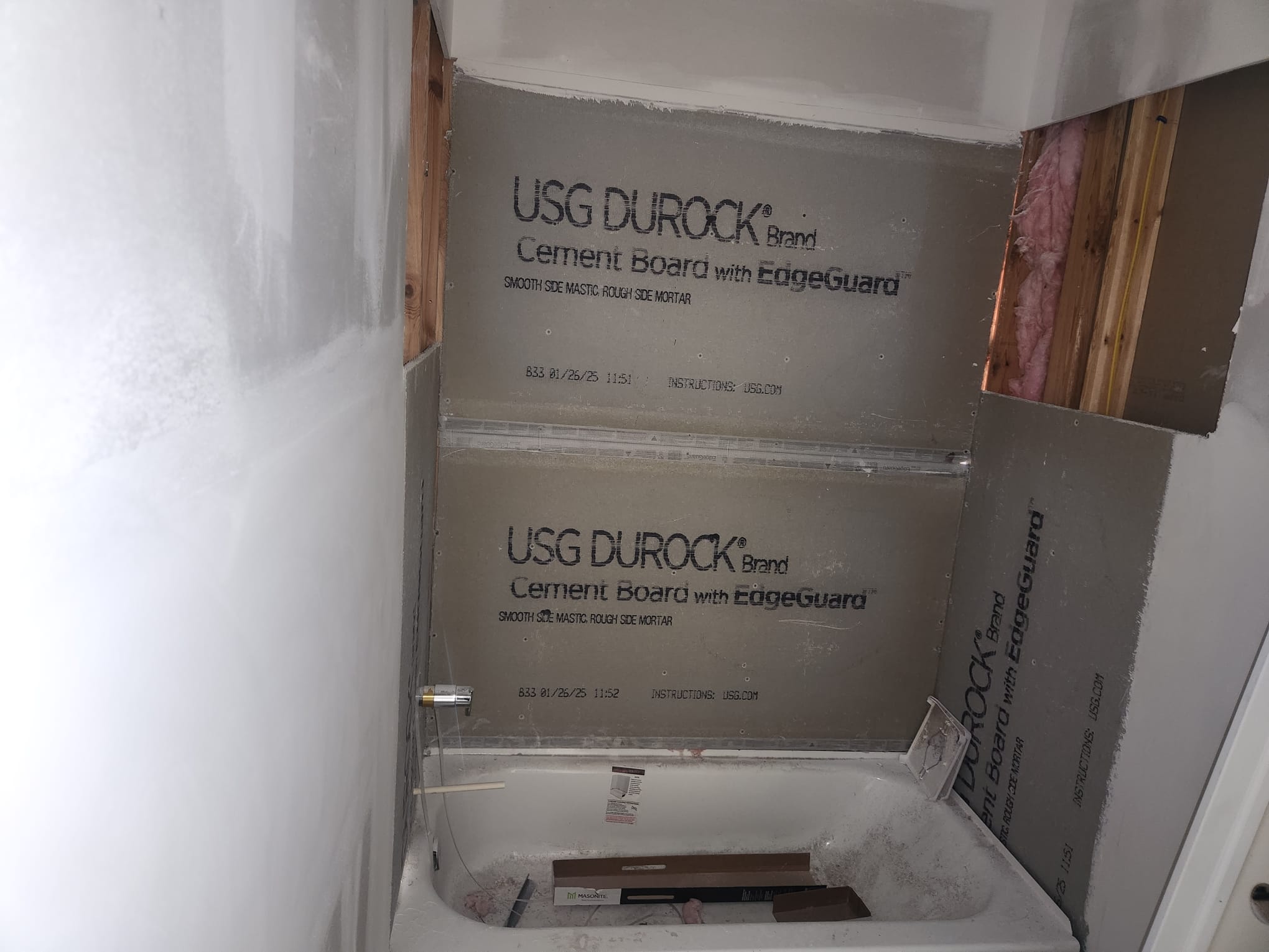 Bathroom shower area with USG Durock cement board installation