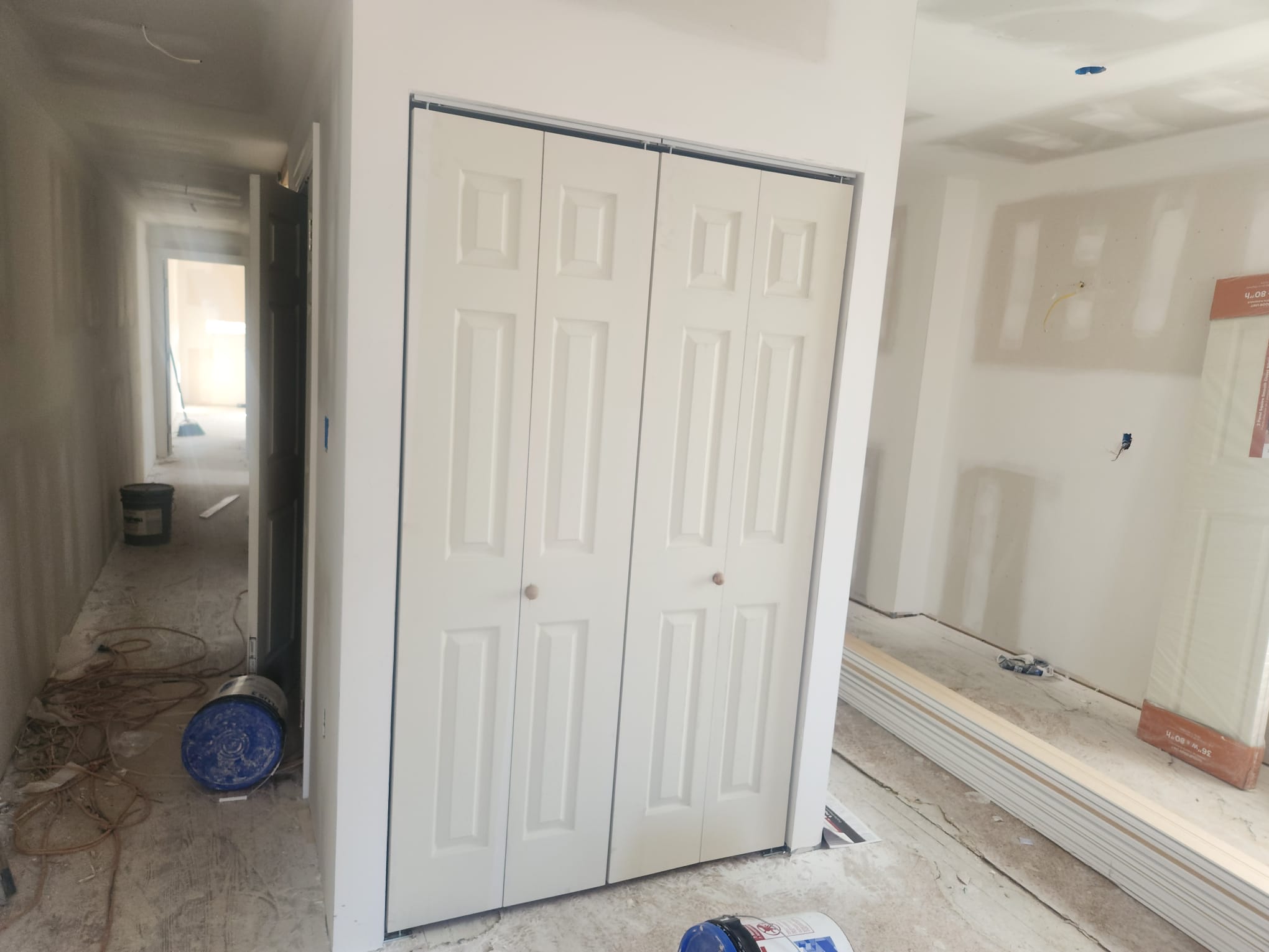 Interior remodel with closet doors and drywall finishing