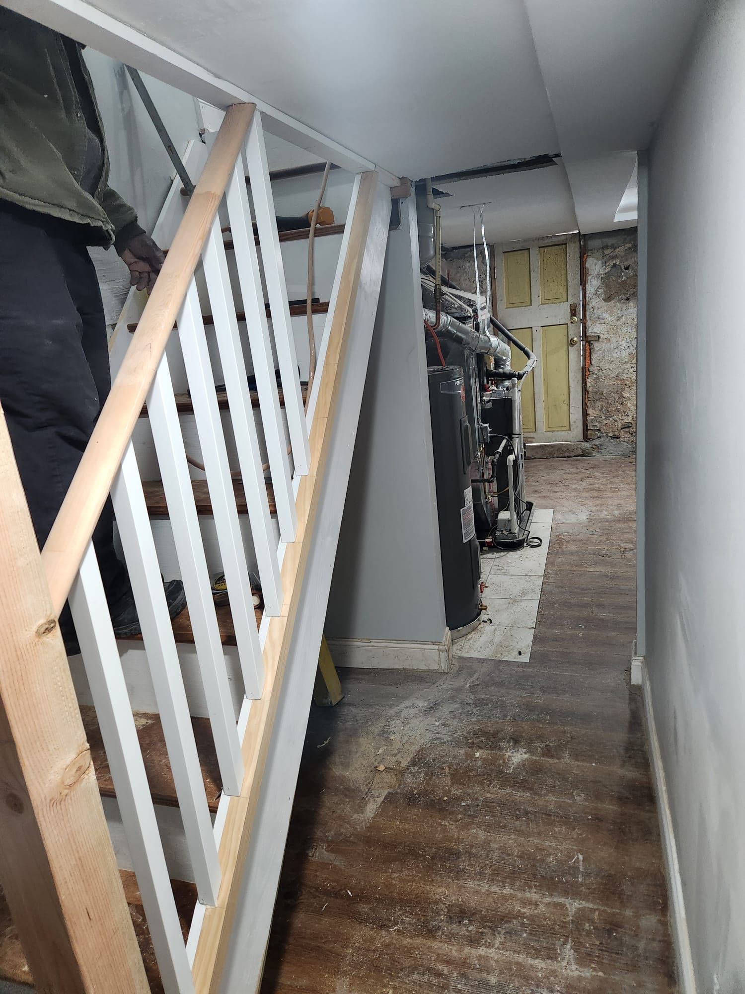 Staircase with installed metal railings