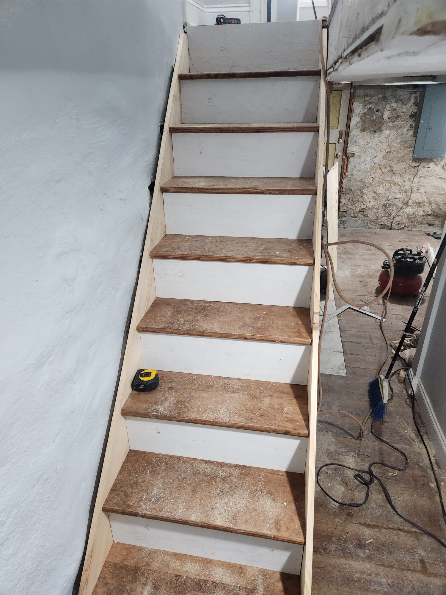 Staircase carpentry — wood treads with white risers